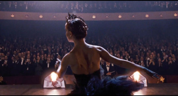 Black Swan: A New York City ballet company is producing Swan Lake, and director Thomas Leroy (Cassel) decides to replace prima ballerina Beth MacIntyre (Ryder) with ballerina Nina (Portman). Nina lives with Erica (Hershey), her overbearing mother and a former ballerina. Nina finds competition in new dancer Lily (Kunis).